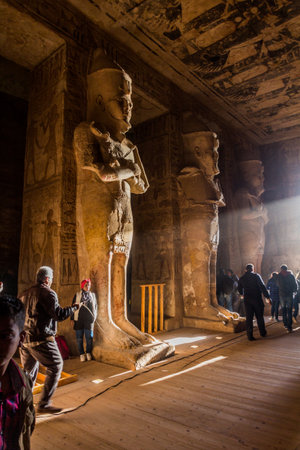 ABU SIMBEL, EGYPT - FEB 22, 2019: Osiride statues of Ramesses II in the Great Hypostyle Hall in the...