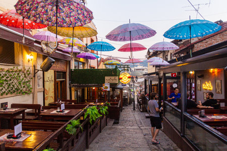 SKOPJE, NORTH MACEDONIA - AUGUST 10, 2019: Street with umbrellas in Charshija (Bazaar) neighborhood of Skopje, North Macedoniaのeditorial素材