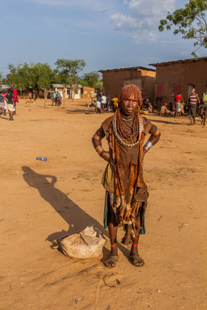 TURMI, ETHIOPIA - FEBRUARY 3, 2020: Hamer tribe woman at a market in Turmi, Ethiopia
