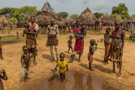 KORCHO, ETHIOPIA - FEBRUARY 4, 2020: Members of Karo tribe in their Korcho village, Ethiopia
