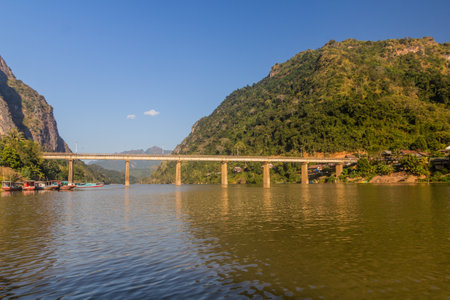 Bridge across Nam Ou river in Nong Khiaw, Laosの写真素材
