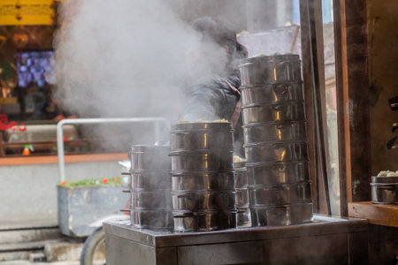Morning view of dumplings being prepared for breakfast in Beijing, Chinaの写真素材