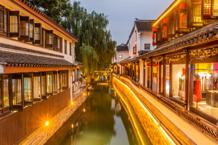 Evening view of a water canal in Suzhou, Jiangsu province, Chinaの写真素材