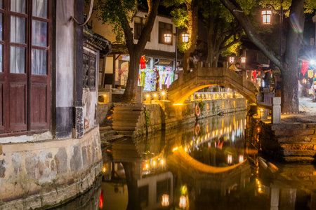 LUZHI, CHINA - OCTOBER 27, 2019: Evening view of a canal in Luzhi water town, Jiangsu province, Chinaのeditorial素材