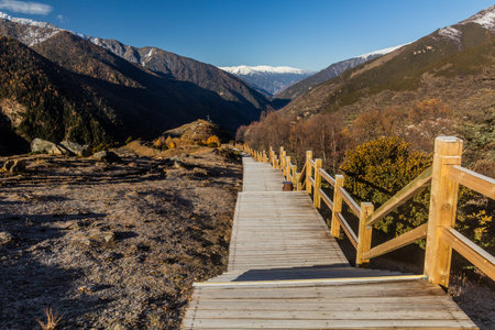 Boardwalk in Haizi valley near Siguniang mountain in Sichuan province, Chinaの写真素材
