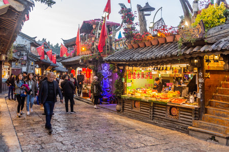 LIJIANG, CHINA  - NOVEMBER 8, 2019: Crowds of people in the old town of Lijiang, Yunnan province, Chinaのeditorial素材