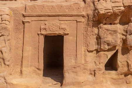 Rock cut tomb 37 (Lion tomb) in Jabal Al Banat hill at Hegra (Mada'in Salih) site near Al Ula, Saudi Arabiaの写真素材