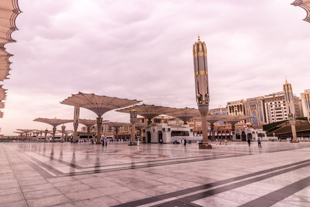 MEDINA, SAUDI ARABIA - NOVEMBER 13, 2021: Shading umbrellas of the Prophet's Mosque in Al Haram area of Medina, Saudi Arabiaのeditorial素材