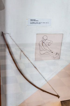 KAMPALA, UGANDA - MARCH 1, 2020: Musical bow exhibit in the Uganda Museum in Kampala, Uganda
