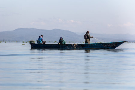 NAIVASHA, KENYA - FEBRUARY 17, 2020: Fishermen on Naivasha lake, Kenya