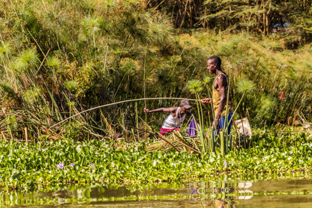 NAIVASHA, KENYA - FEBRUARY 17, 2020: Fishermen on Naivasha lake, Kenyaのeditorial素材