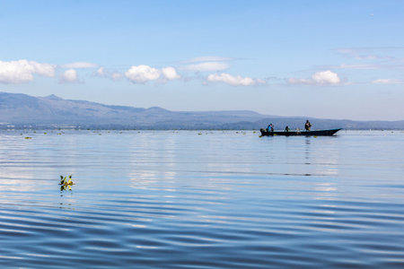 NAIVASHA, KENYA - FEBRUARY 17, 2020: Fishermen on Naivasha lake, Kenyaのeditorial素材