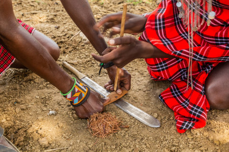 Detail of Masai men making a fire, Kenyaの写真素材