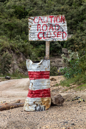 Sign caution road closed in the Hell's Gate National Park, Kenyaの写真素材