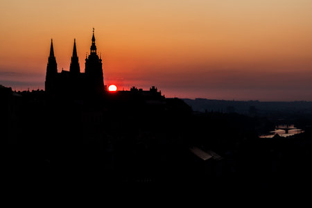Early morning view of St. Vitus cathedral silhouette in Prague, Czech Republicの写真素材