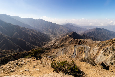 View of Al Souda mountains with a winding road near Abha, Saudi Arabiaの写真素材