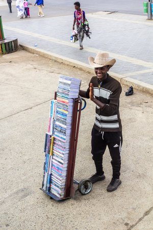 ADDIS ABABA, ETHIOPIA - JANUARY 25, 2020: Book seller on Meskel Square in Addis Ababa, Ethiopia