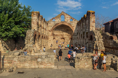 NESEBAR, BULGARIA - JULY 24, 2019: Tourists visit the Church of Saint Sophia ruin in Nesebar, Bulgariaのeditorial素材