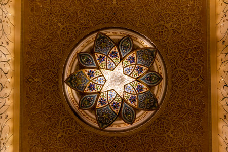 ABU DHABI, UAE - OCTOBER 17, 2021: Ceiling in Sheikh Zayed Grand Mosque in Abu Dhabi, United Arab...