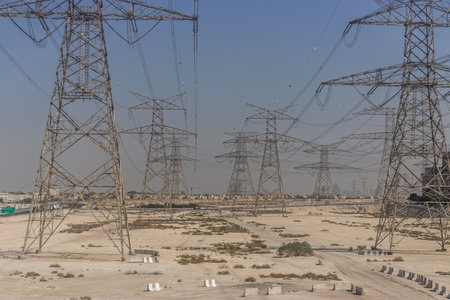 Pylons of high voltage electric transmission lines in Dubai, United Arab Emirates.の写真素材