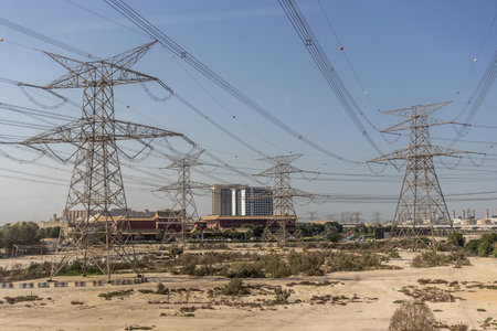 Pylons of high voltage electric transmission lines in Dubai, United Arab Emirates.の写真素材