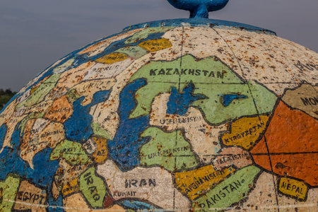 MURCHISON FALLS, UGANDA - MARCH 8, 2020: Detail of a globe in Murchison Falls national park, Ugandaのeditorial素材