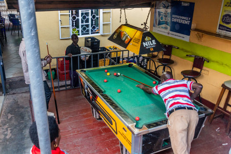 KABALE, UGANDA - MARCH 19, 2020: Pool game in a local pub in Kabale, Uganda
