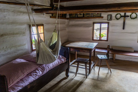 ROZNOV POD RADHOSTEM, CZECH REPUBLIC - JULY 15, 2021: Interior of an old house in the open air museum (Valasske muzeum v prirode) in Roznov pod Radhostem, Czechiaのeditorial素材