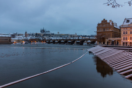 Morning winter view of Prague castle and Charles bridge in Prague, Czech Republicの写真素材