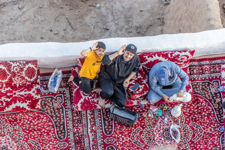 DHAHRAN AL JANUB, SAUDI ARABIA - NOVEMBER 25, 2021: Local people on a terrace of an old house in Dhahran al Janub, Saudi Arabiaのeditorial素材