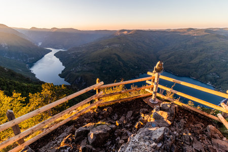 Sunset view of Drina river valley between Serbia and Bosnia and Herzegovina from Banjska Stena Viewpoint in Tara National Parkの写真素材