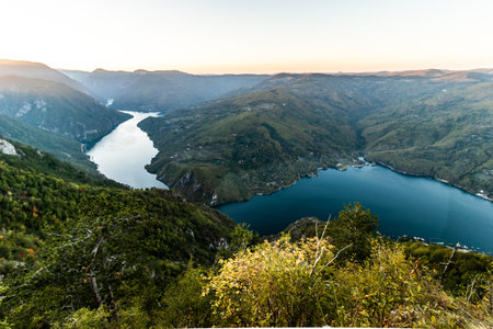 Sunset view of Drina river valley between Serbia and Bosnia and Herzegovina from Banjska Stena Viewpoint in Tara National Parkの写真素材