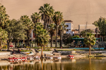 HUACACHINA, PERU - OCTOBER 27, 2022:  Pond in Huacachina oasis near Ica town, Peruのeditorial素材