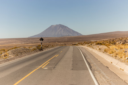Misti volcano and a road in Reserva nacional de Salinas y Aguada Blanca, Peruの写真素材