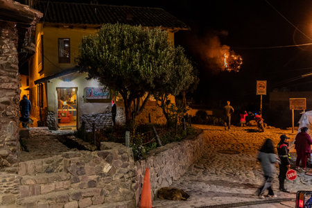 OLLANTAYTAMBO, PERU - NOVEMBER 7, 2022: Wildfire at the mountain above Ollantaytambo village, Peru.