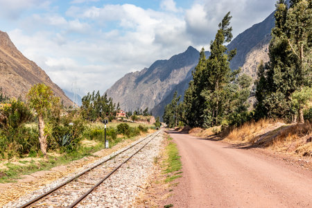 Railway and a road in the Sacred Valley of Incas, Peruの写真素材