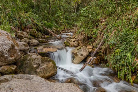 Small stream in Urubamba river valley near Machu Picchu, Peru