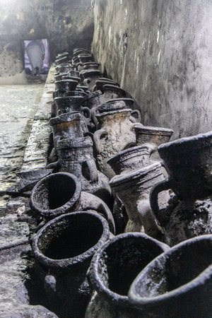 LALISH, IRAQ - SEPTEMBER 30, 2022: Jars in the Sheikh Adi ibn Musafir tomb in Lalish temple complex, Kurdistan Region of Iraqの写真素材
