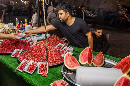 ERBIL, IRAQ - OCTOBER 7, 2022: Pomegranate and water melon stall at Bakhi Shar (City Park) in Erbil (Hawler), Kurdistan Region of Iraqのeditorial素材