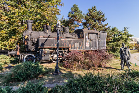 NOVI SAD, SERBIA - OCTOBER 3, 2021: Old steam train engine in fron tof the railway station in Novi Sad, Serbiaのeditorial素材