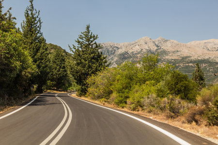 Road 82 in Evrotas valley near Sparta town on Peloponnese peninsula, Greeceの写真素材