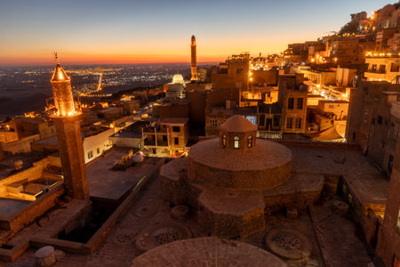 Evening view of the old town in Mardin with Emir Hamami baths in the foreground, Turkeyの写真素材