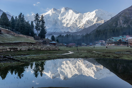 Nanga Parbat mountain reflection in a lake at Fairy Meadows in the Gilgit-Baltistan region in Pakistanの写真素材