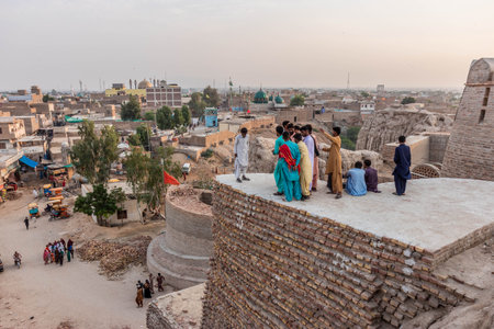 SEHWAN SHARIF, PAKISTAN - OCTOBER 30, 2023: People at Purana Qila fort in Sehwan Sharif town, Sindh province, Pakistanのeditorial素材