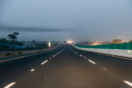 Night view of a motorway near Multan, Punjab province, Pakistanの写真素材