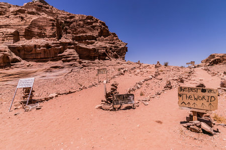PETRA, JORDAN - JULY 12, 2022: Signs near a lookout in the ancient city Petra, Jordanのeditorial素材