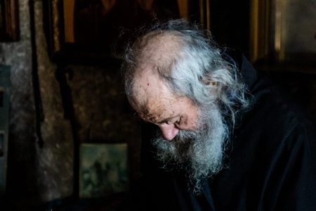 ORHEIUL VECHI, MOLDOVA - MAY 6, 2023: Monk in Cave (Pestera) monastery in Orheiul Vechi, Moldova