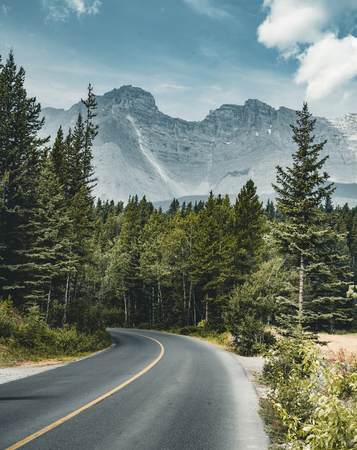 Empty street with mountain panorama in Banff National Park, Canaの写真素材