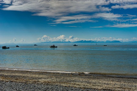 View towards sea with blue sky and a few clouds in Alaska Unitedの写真素材
