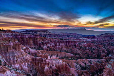 Sunrise over Bryce Canyon with clouds stunstar skyover Bryce Ampの写真素材